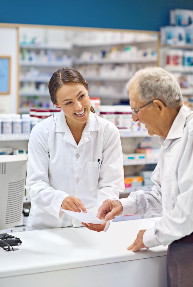 female pharmacist with customer