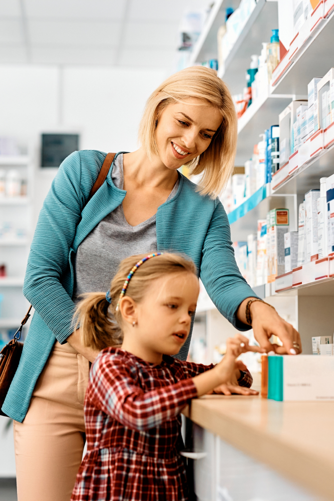 mom and daughter at pharmacy